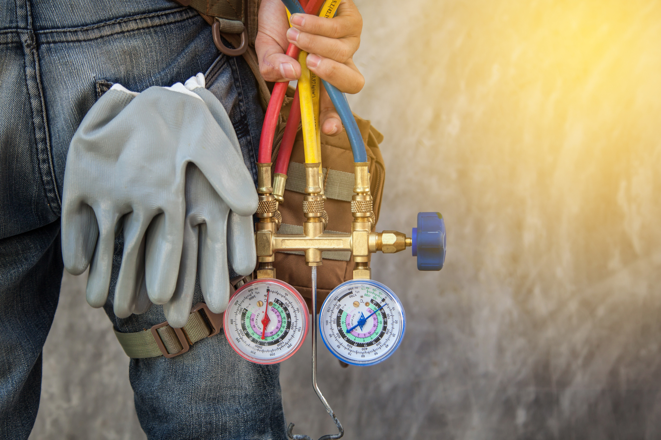 Air Conditioning Technician And A Part Of Preparing To Install New Air Conditioner Air Conditioning Technician And A Part Of Preparing To Install New Air Conditioner